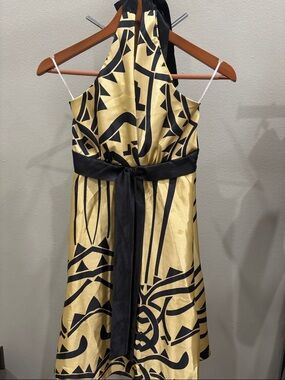 Black & Gold Halter Backless Dress with Waist Sash and tie back.